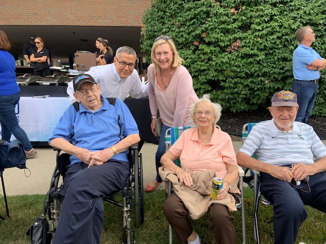 Joe_ Barbara and clients sitting in chair.jpg